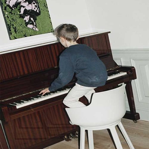 white social boy piano playing